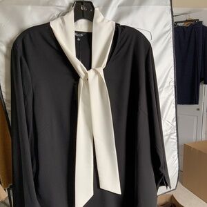 Women’s  black and white blouse with self tie
